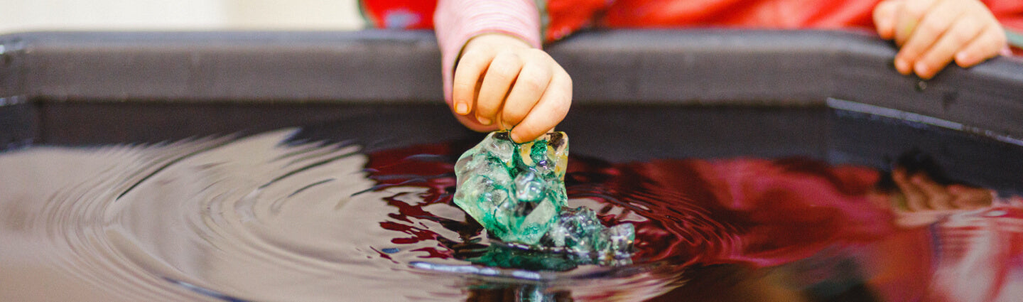 Child playing with water