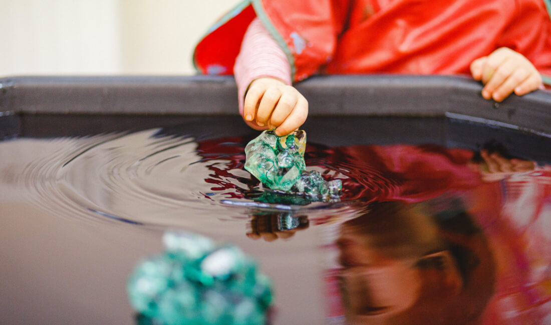 Child playing with water