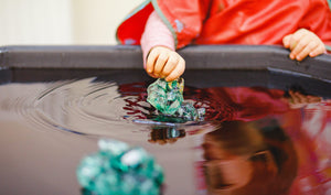 Child playing with water