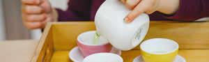 Child pouring liquid